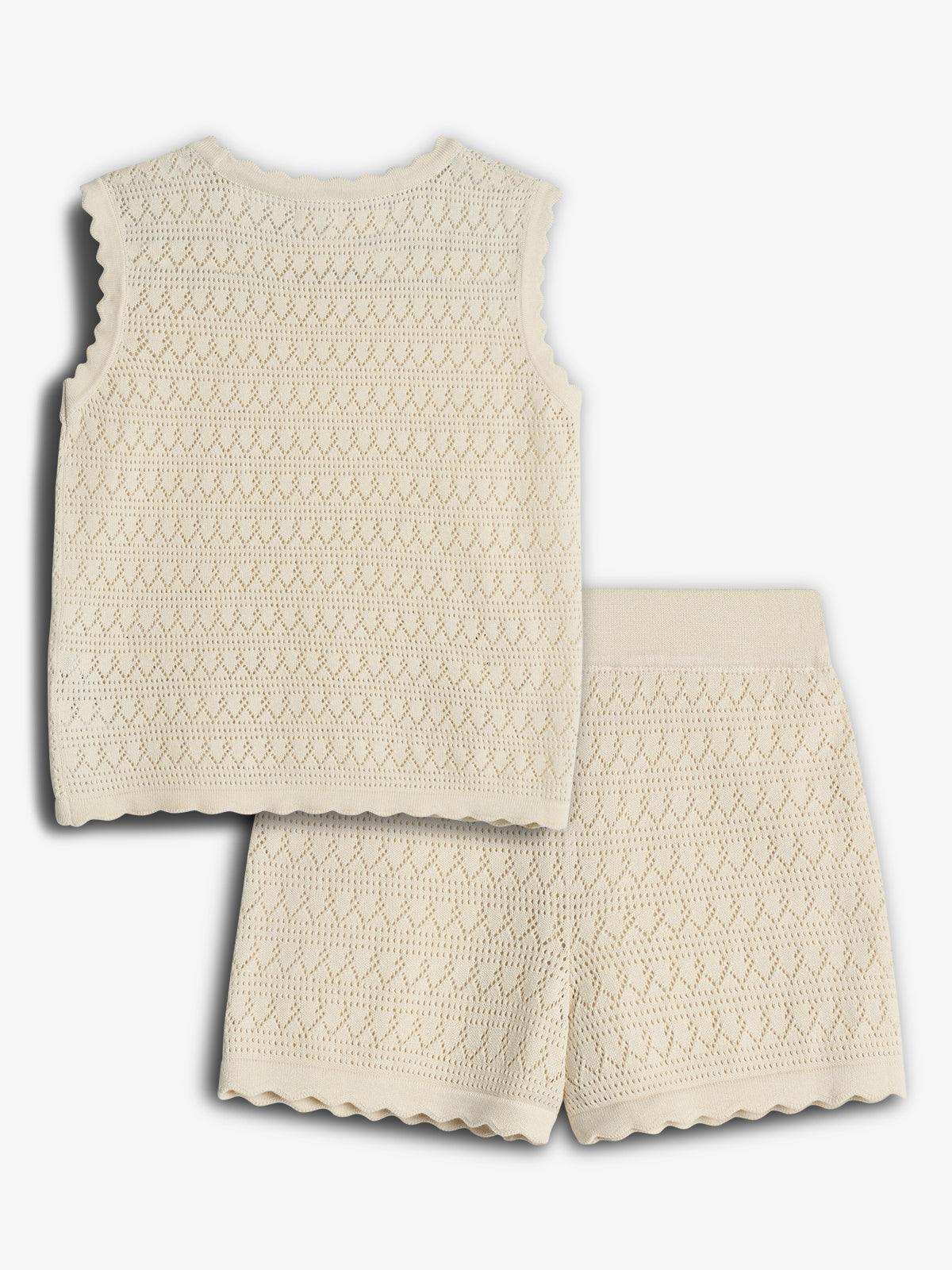 A cream-colored, sleeveless knit top and shorts set, featuring a delicate eyelet pattern and scalloped edges, is displayed against a plain white background.