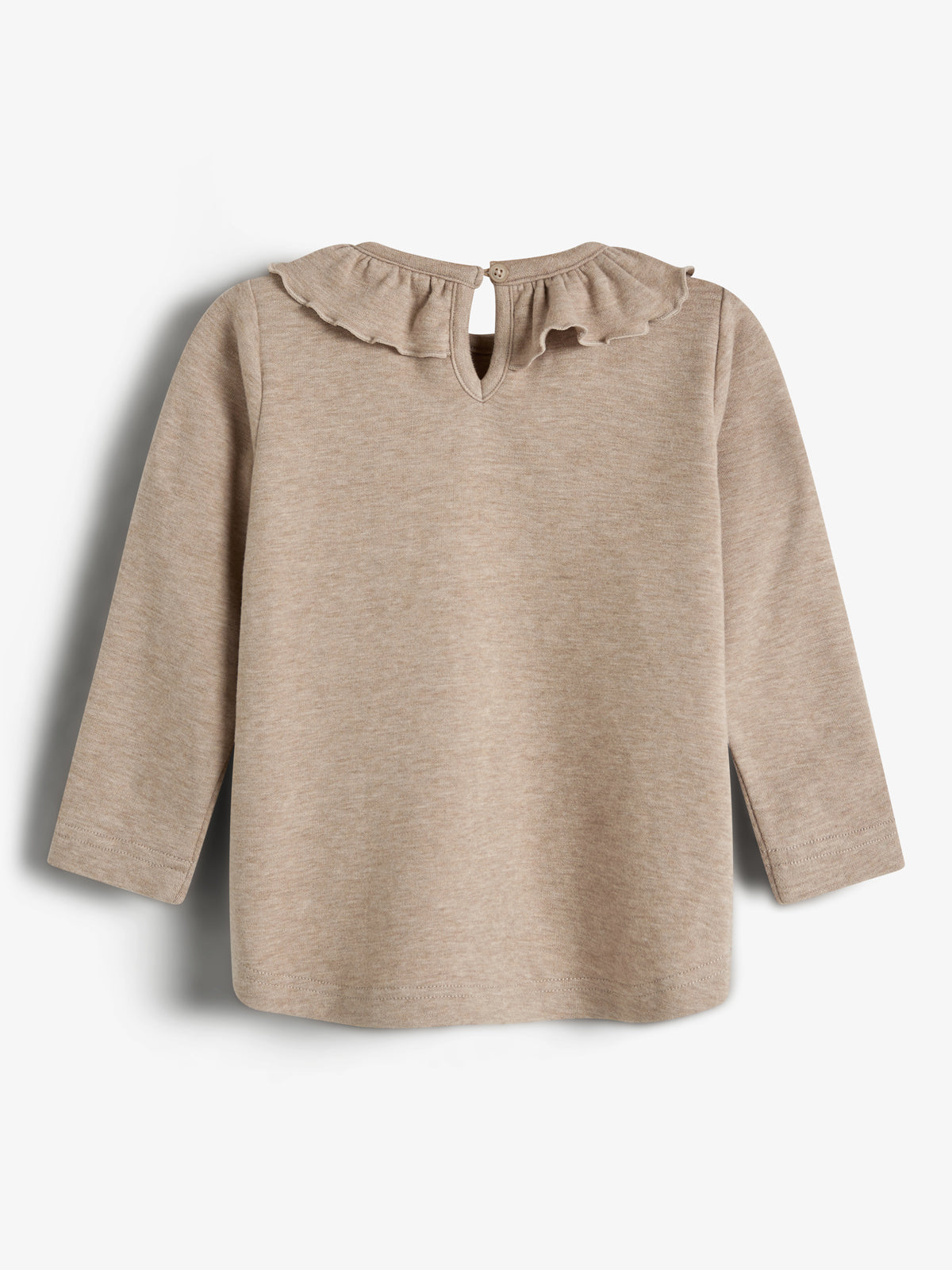 A beige long-sleeve shirt with a ruffled collar and button closure on the back, displayed against a plain white background.
