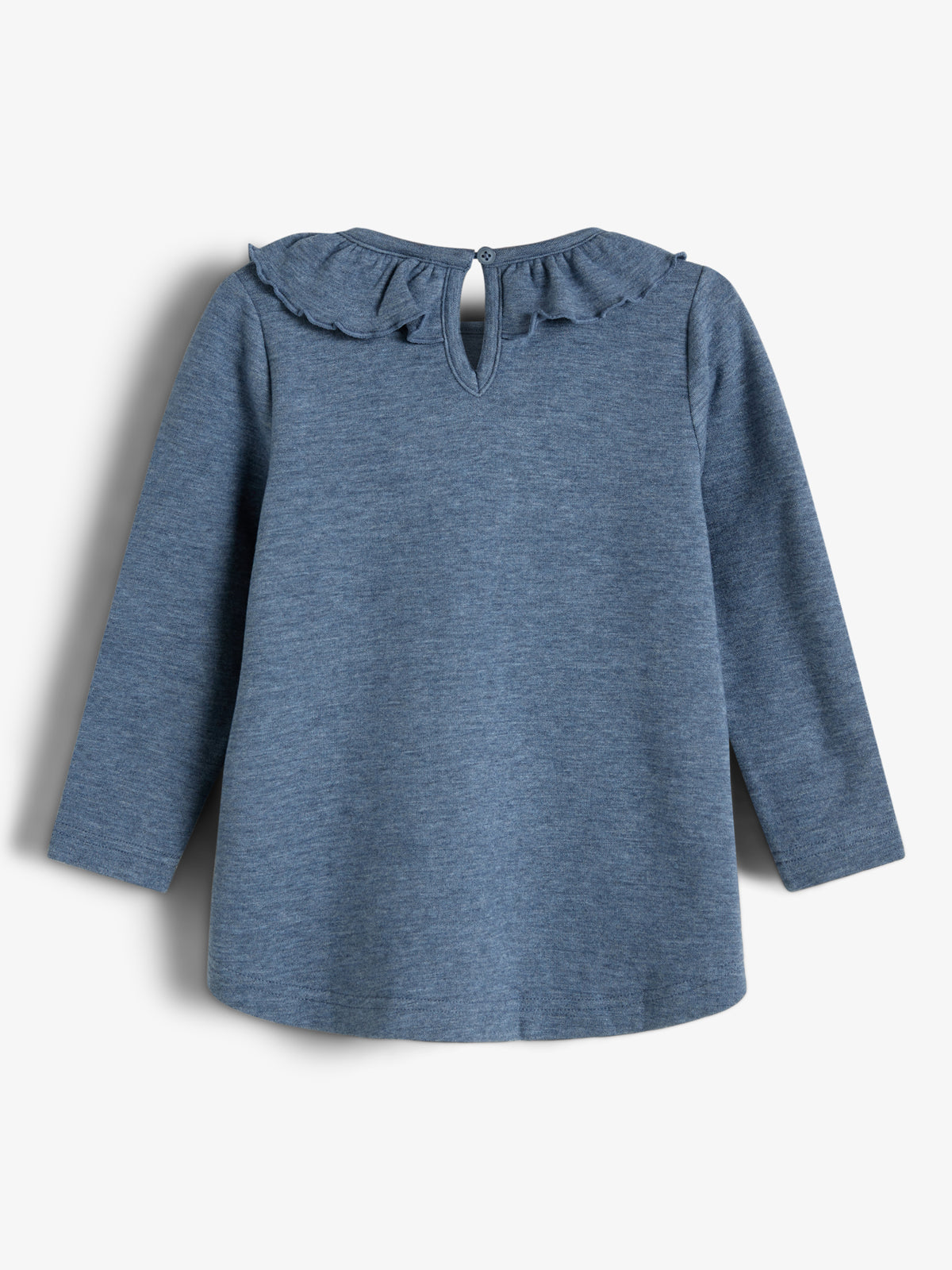 A blue, long-sleeve shirt with ruffled collar detail and button closure is displayed on a plain white background.
